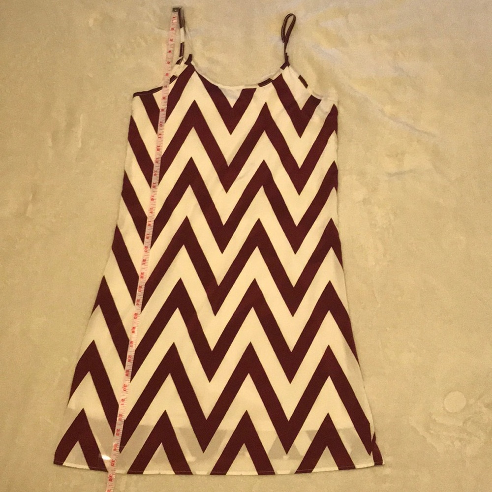 Garnet/maroon chevron dress with bow in back!